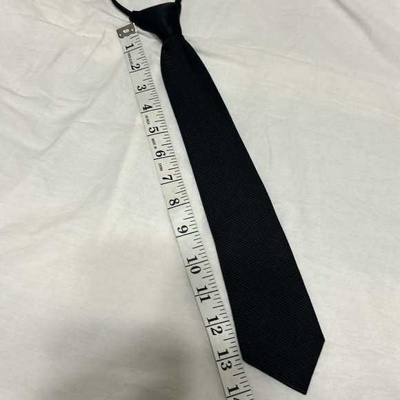 Boys tie in black, zipper adjustable. Preowned great condition. - Picture 5 of 6